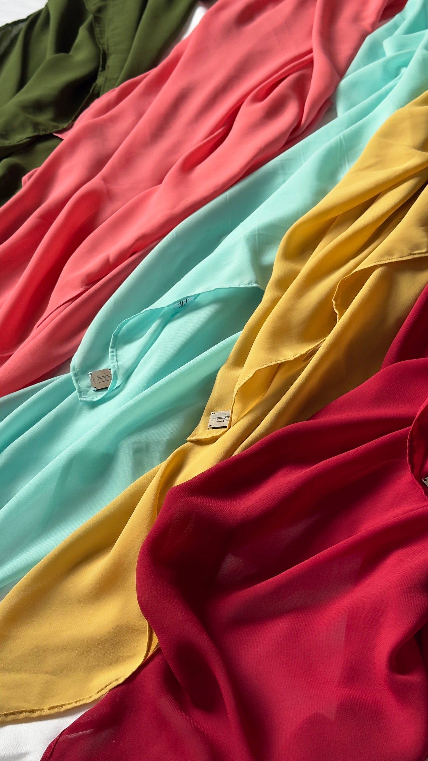 Élan signature scarves